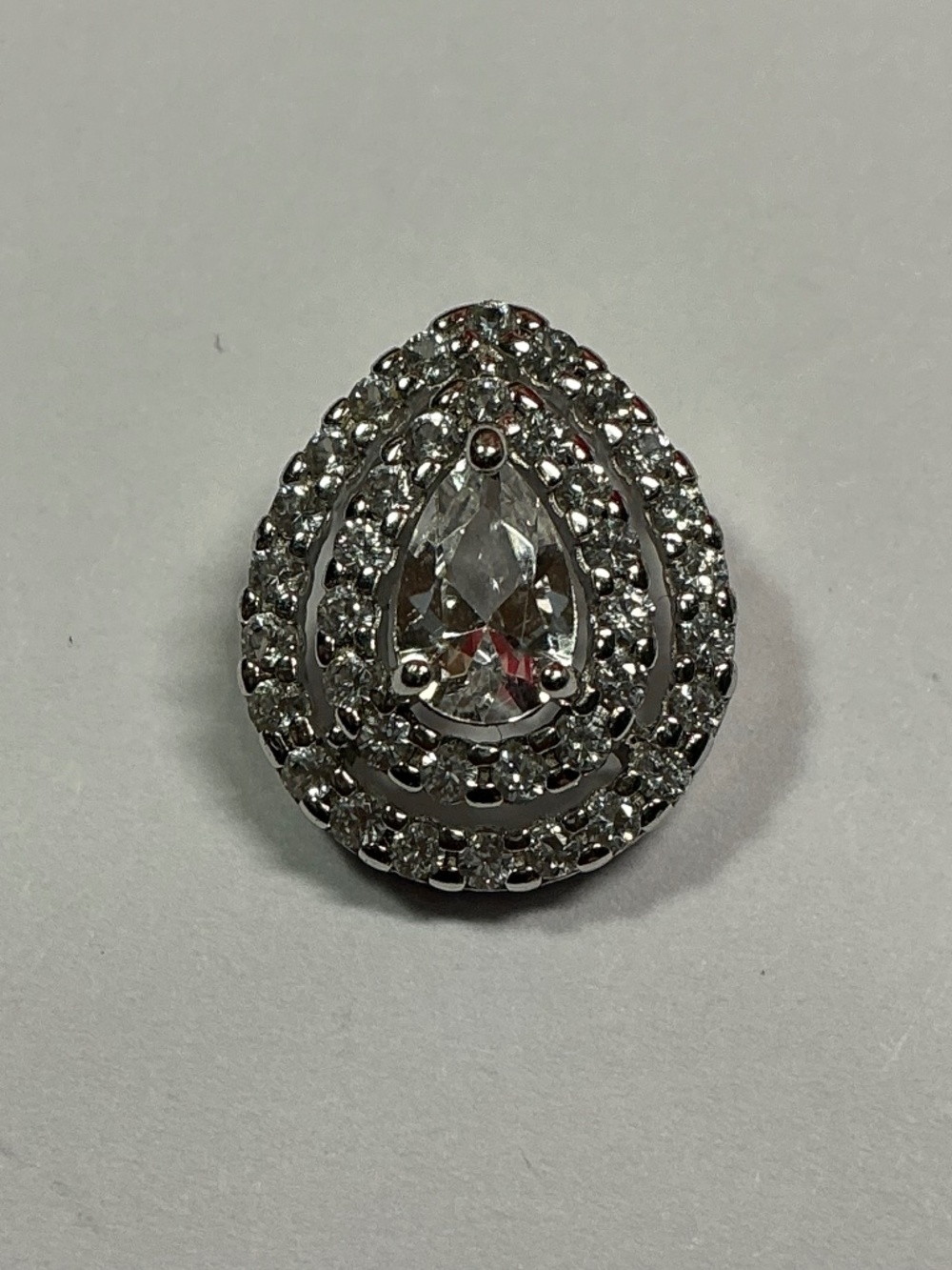 PAJ Sterling Silver Teardrop Shaped Pendant with clear stones. 9/16 inch long